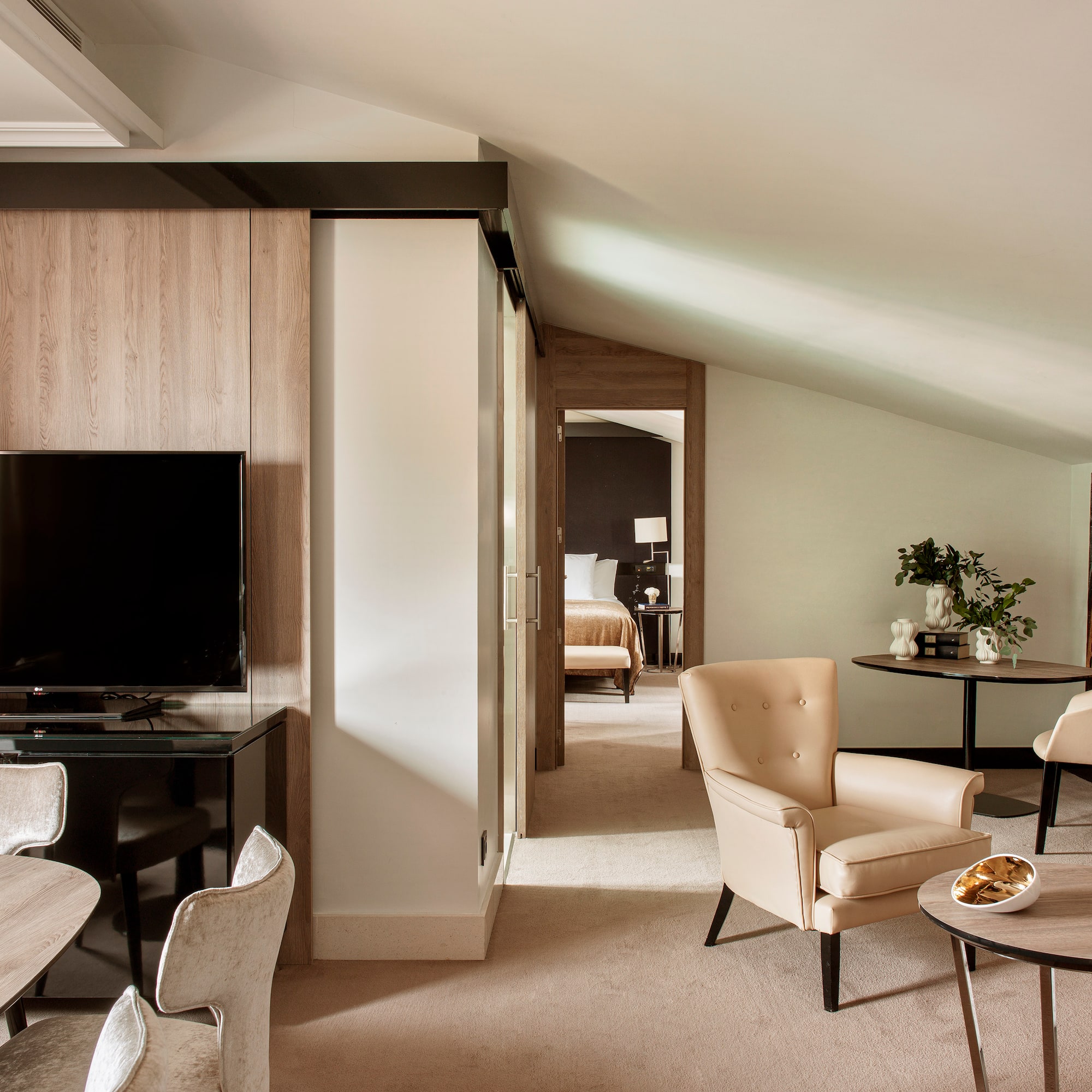 a room with a television and a table