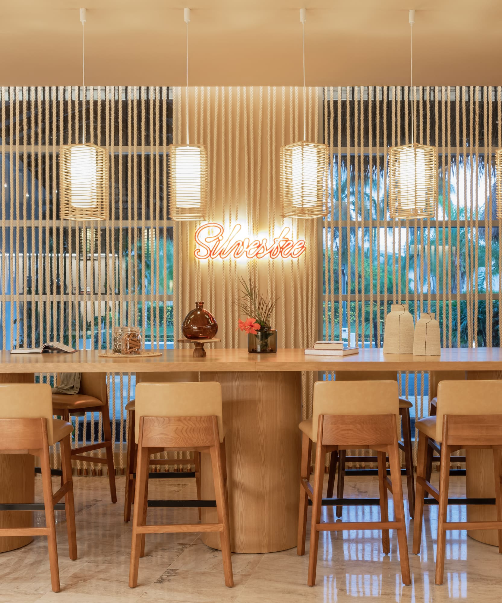 a table with chairs and a table with a sign