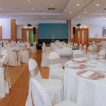 a room with tables and chairs