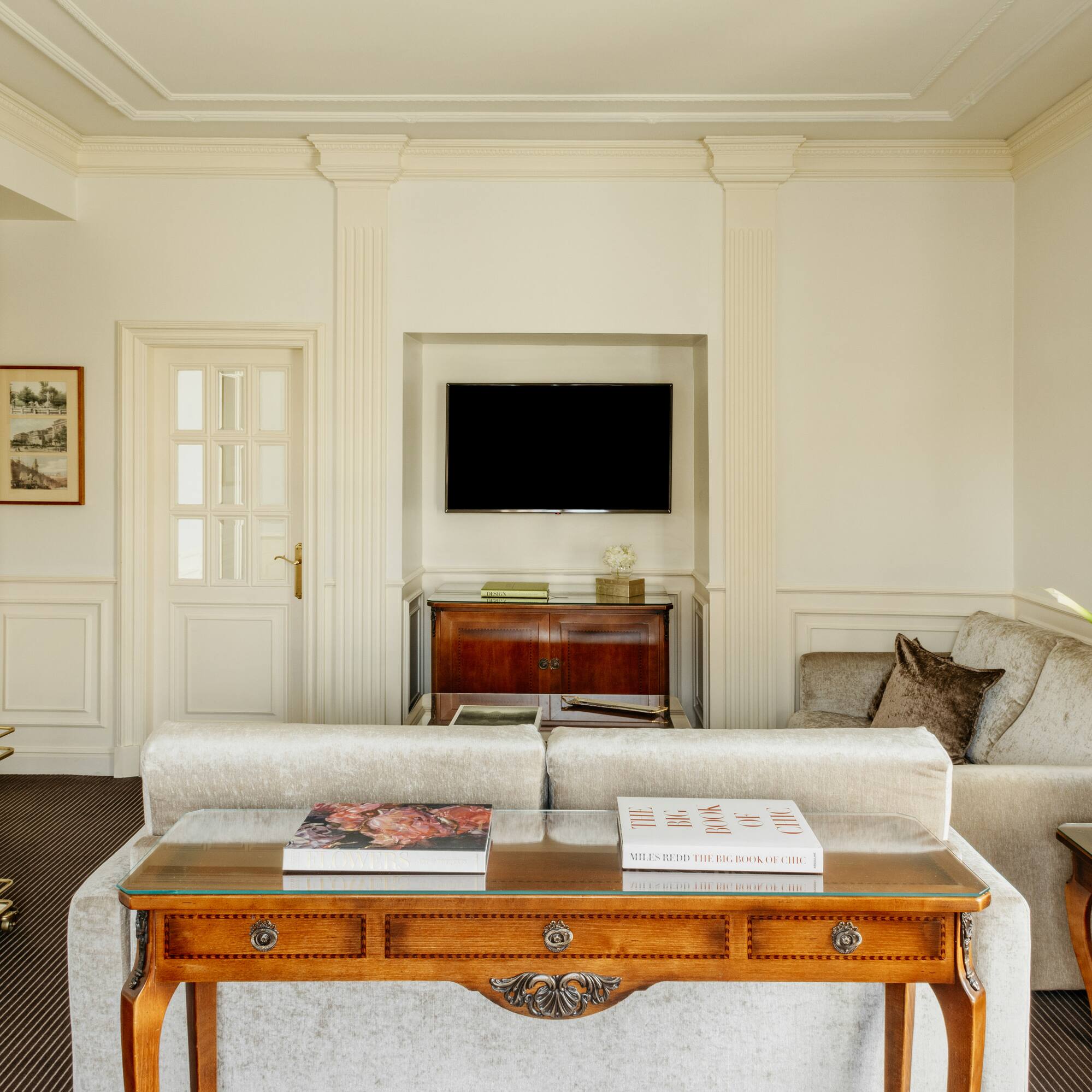 a living room with a couch and a table