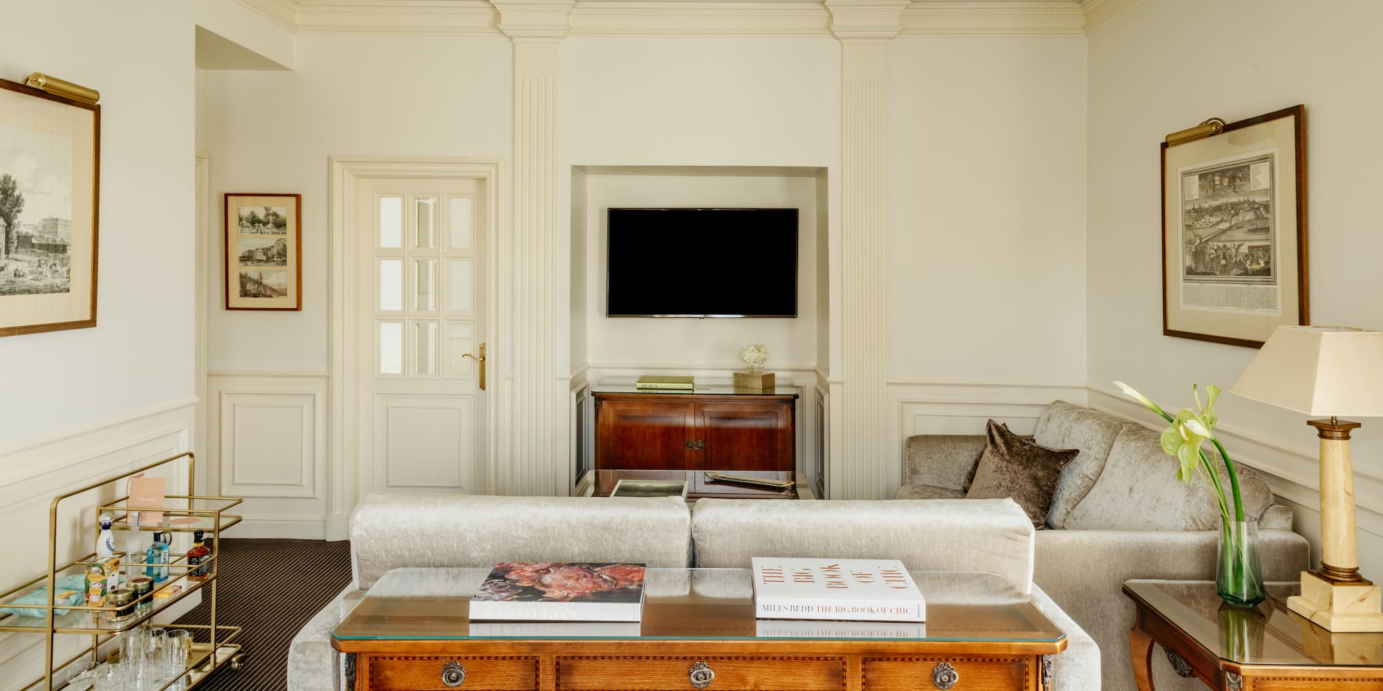 a living room with a couch and a table