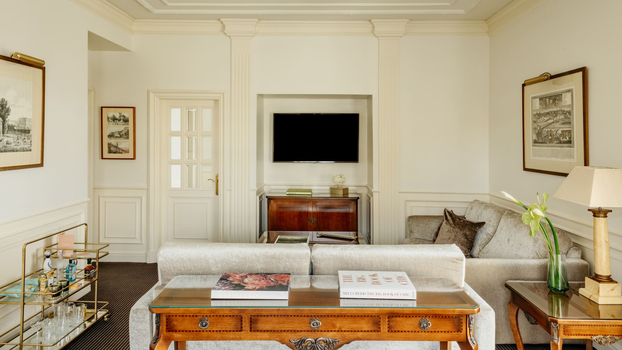 a living room with a couch and a table