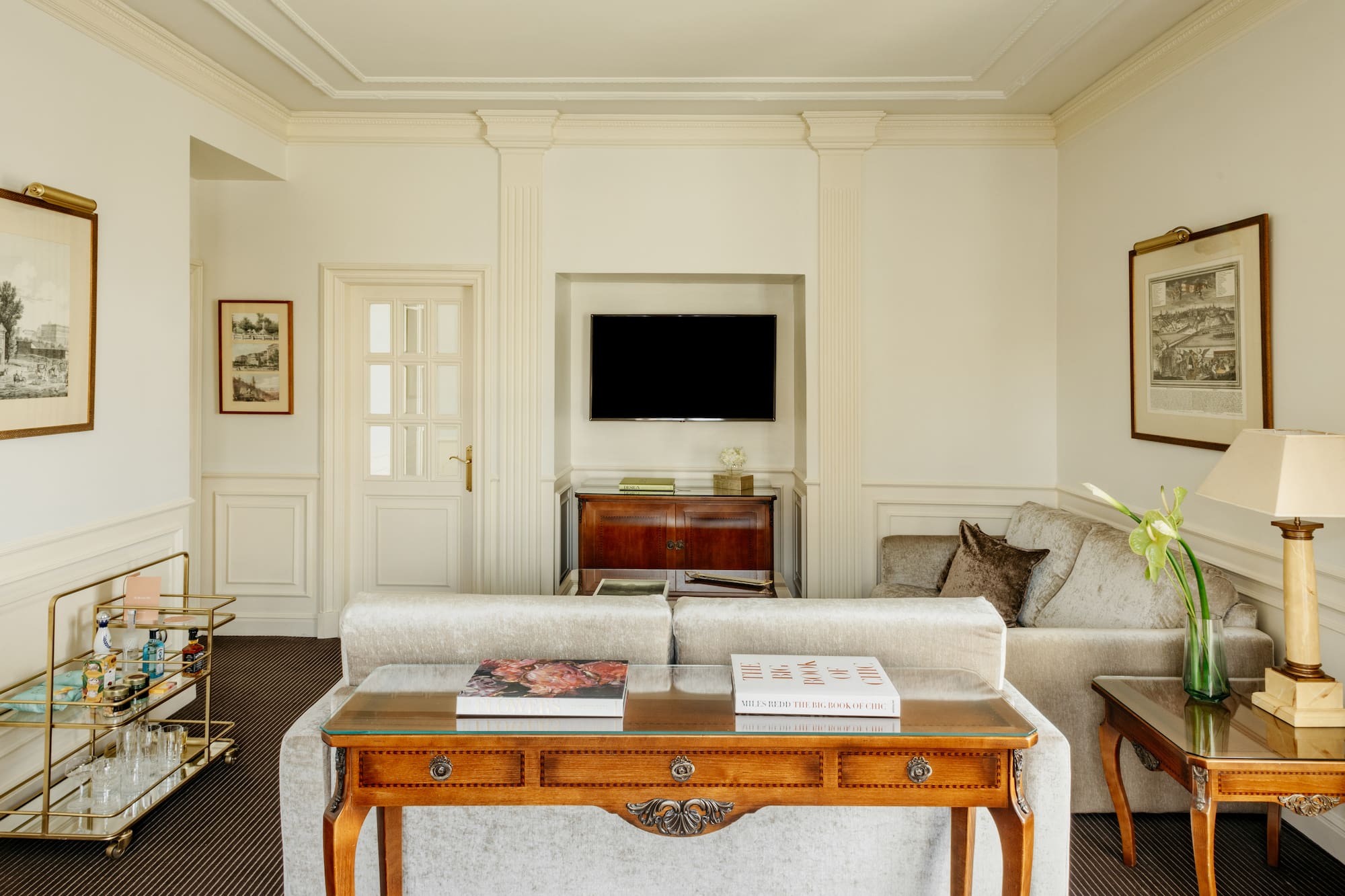 a living room with a couch and a table