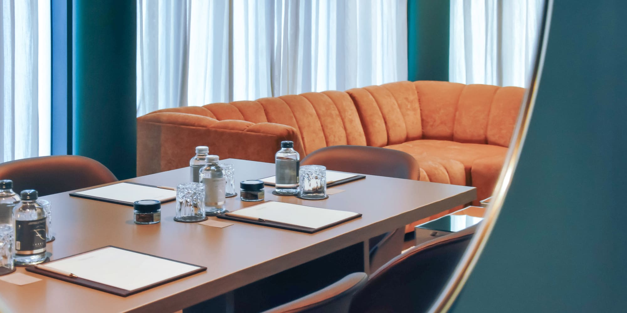 a table with water bottles and napkins on it