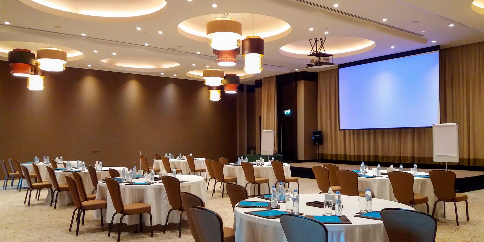 a room with tables and chairs