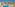 Resort outdoor pool with water slides, sun loungers, and hotel apartments.