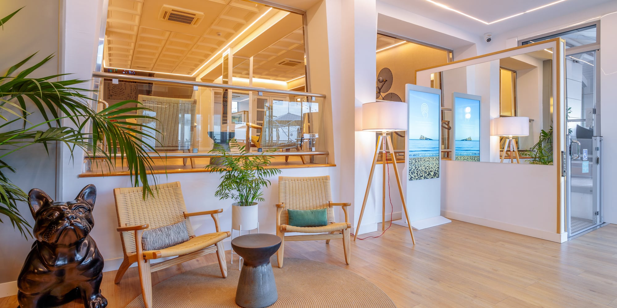 a room with a large window and a large mirror