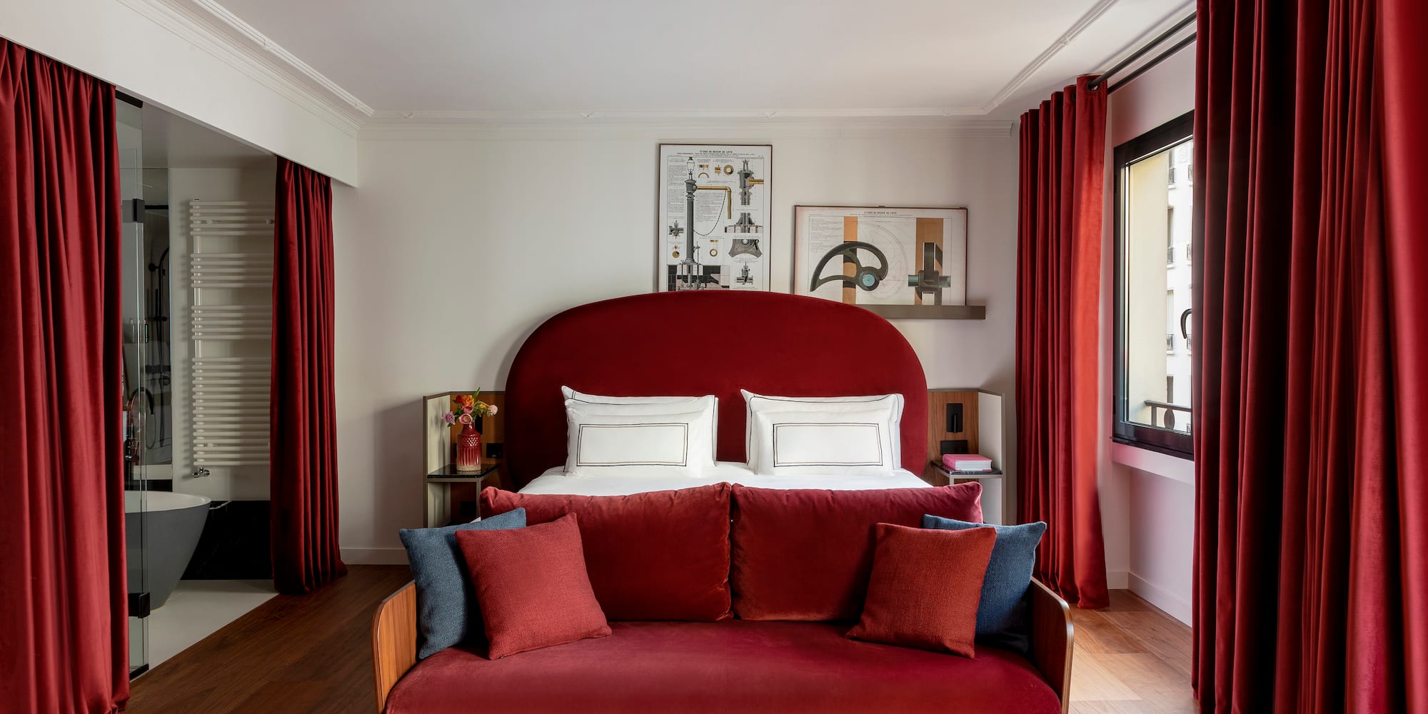 a bed with pillows in a room