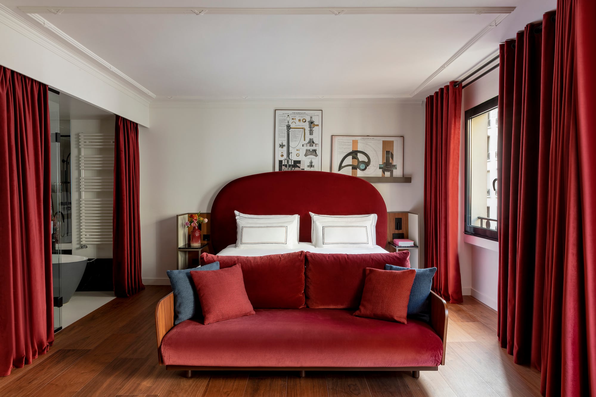 a bed with pillows in a room