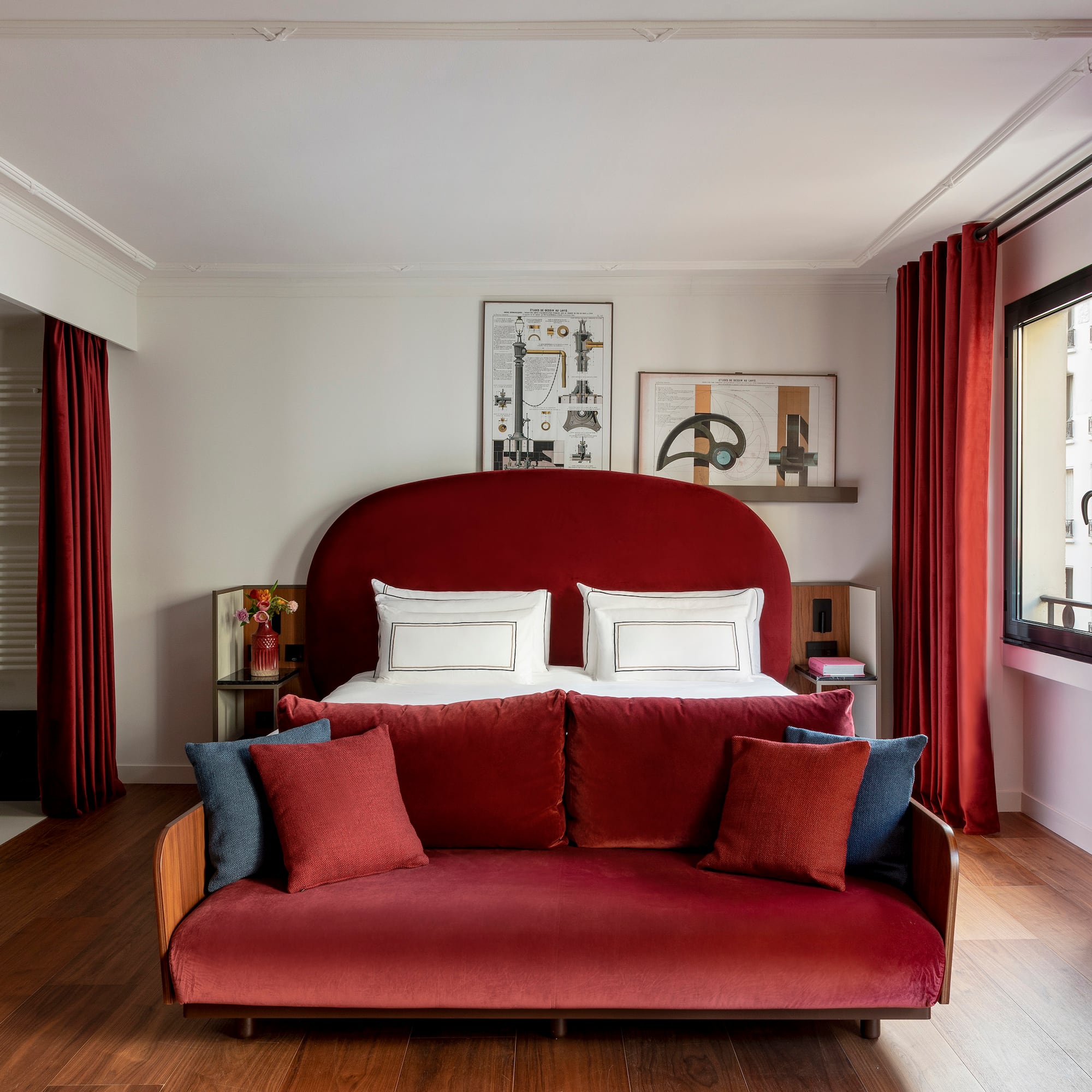 a bed with pillows in a room