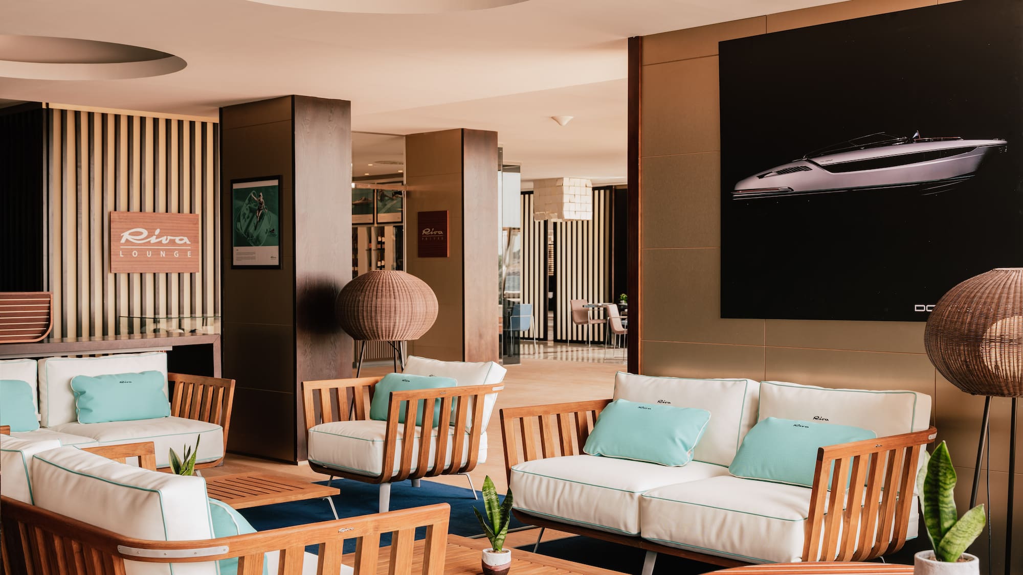 a room with white furniture and a poster on the wall