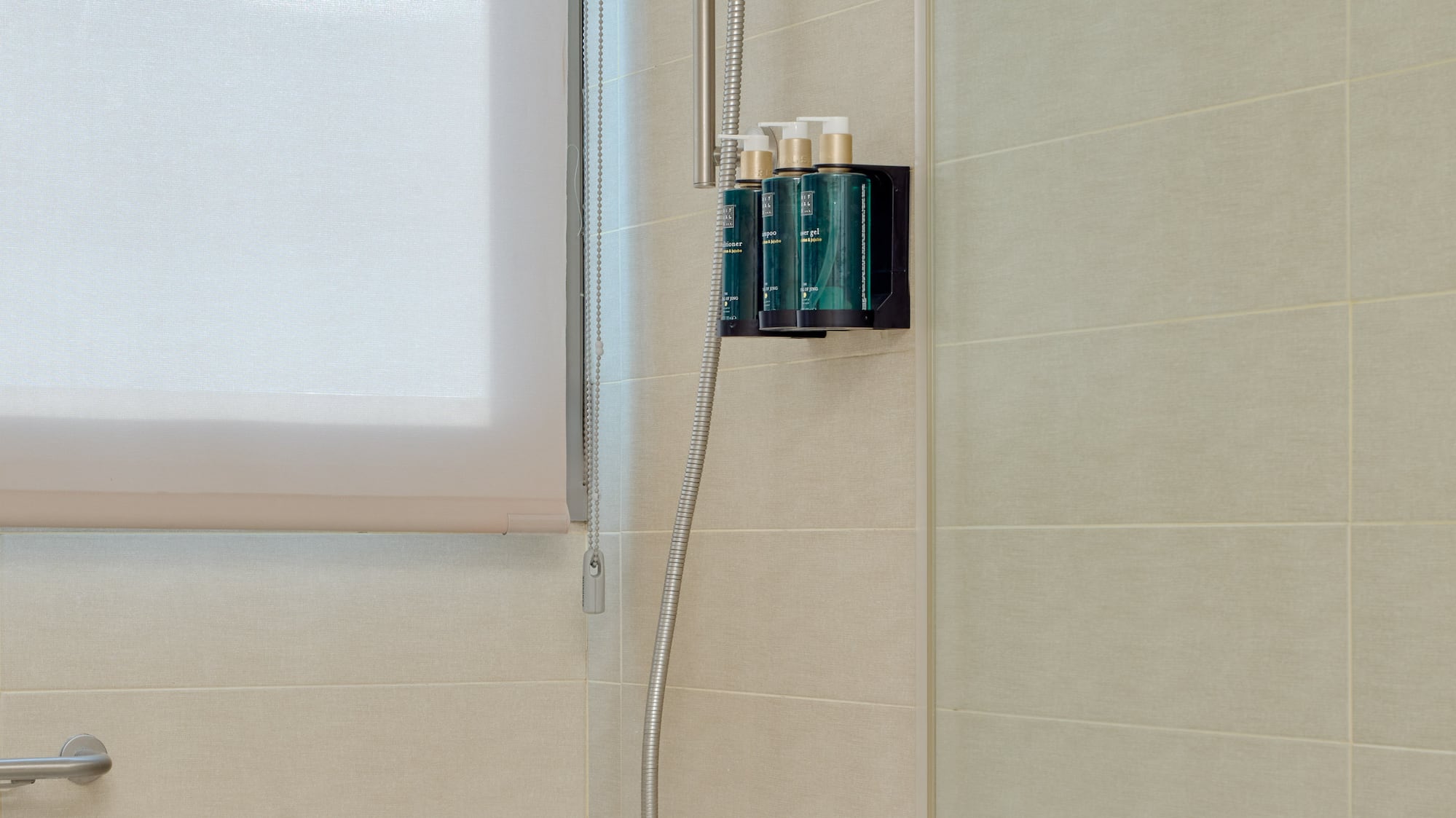 a shower with a tub and shower head