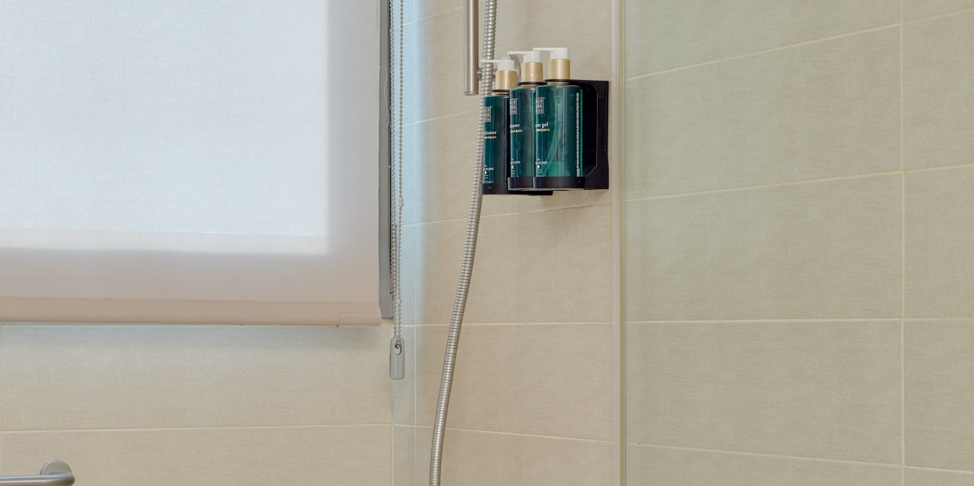 a shower with a tub and shower head