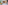 Modern hotel lobby with cream sofas, gold tables, and white marble flooring.
