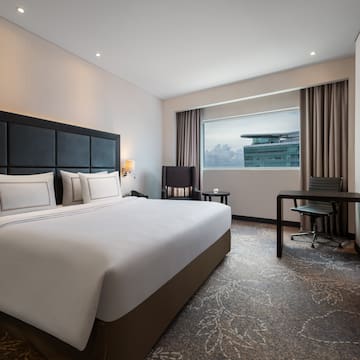 a room with a bed and a desk