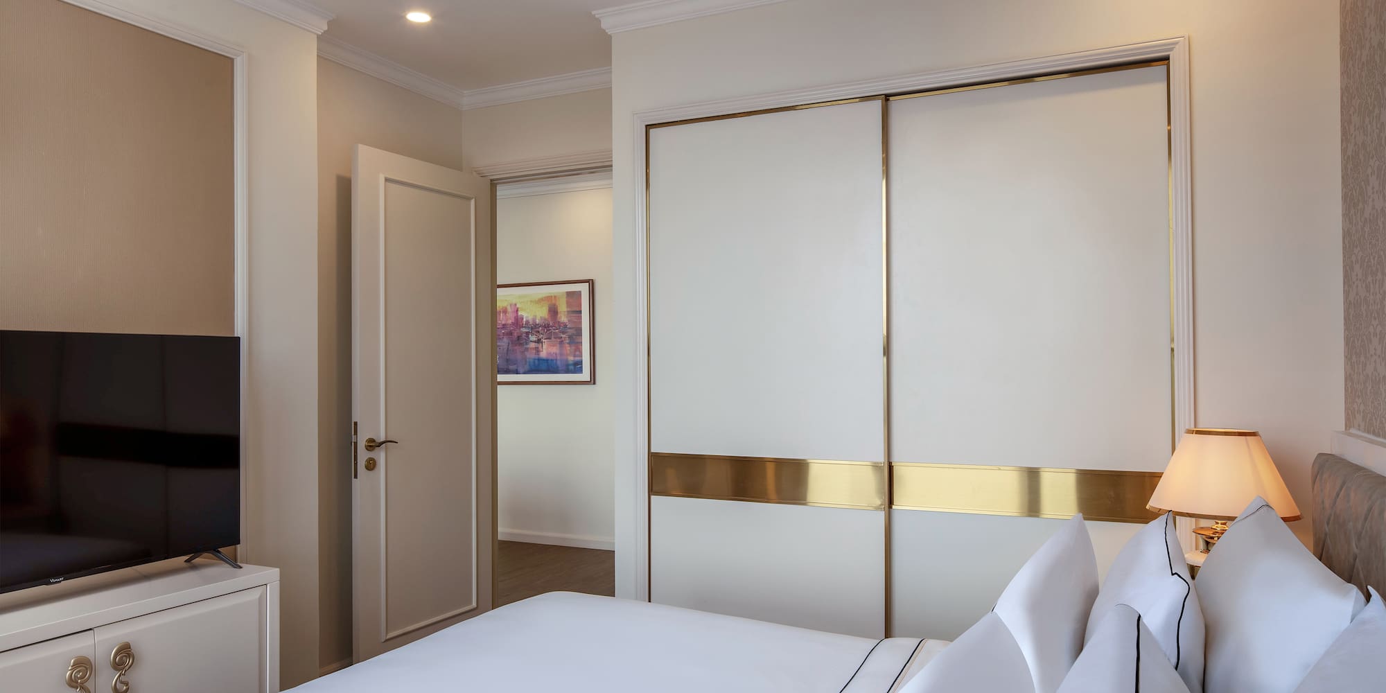 a bedroom with a large closet door