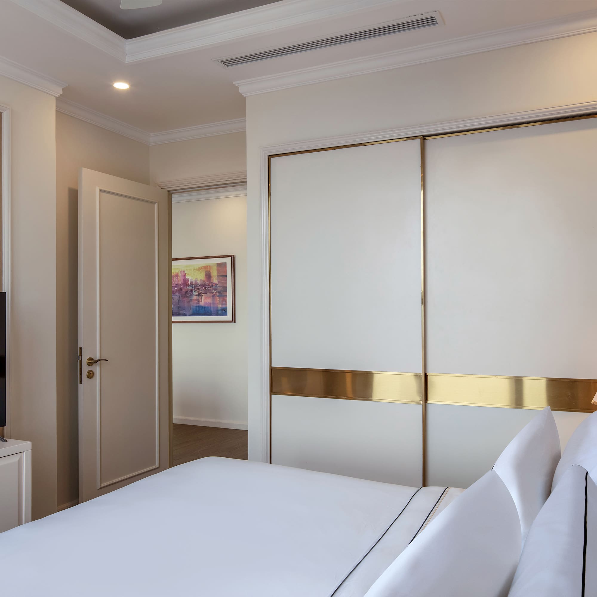 a bedroom with a large closet door