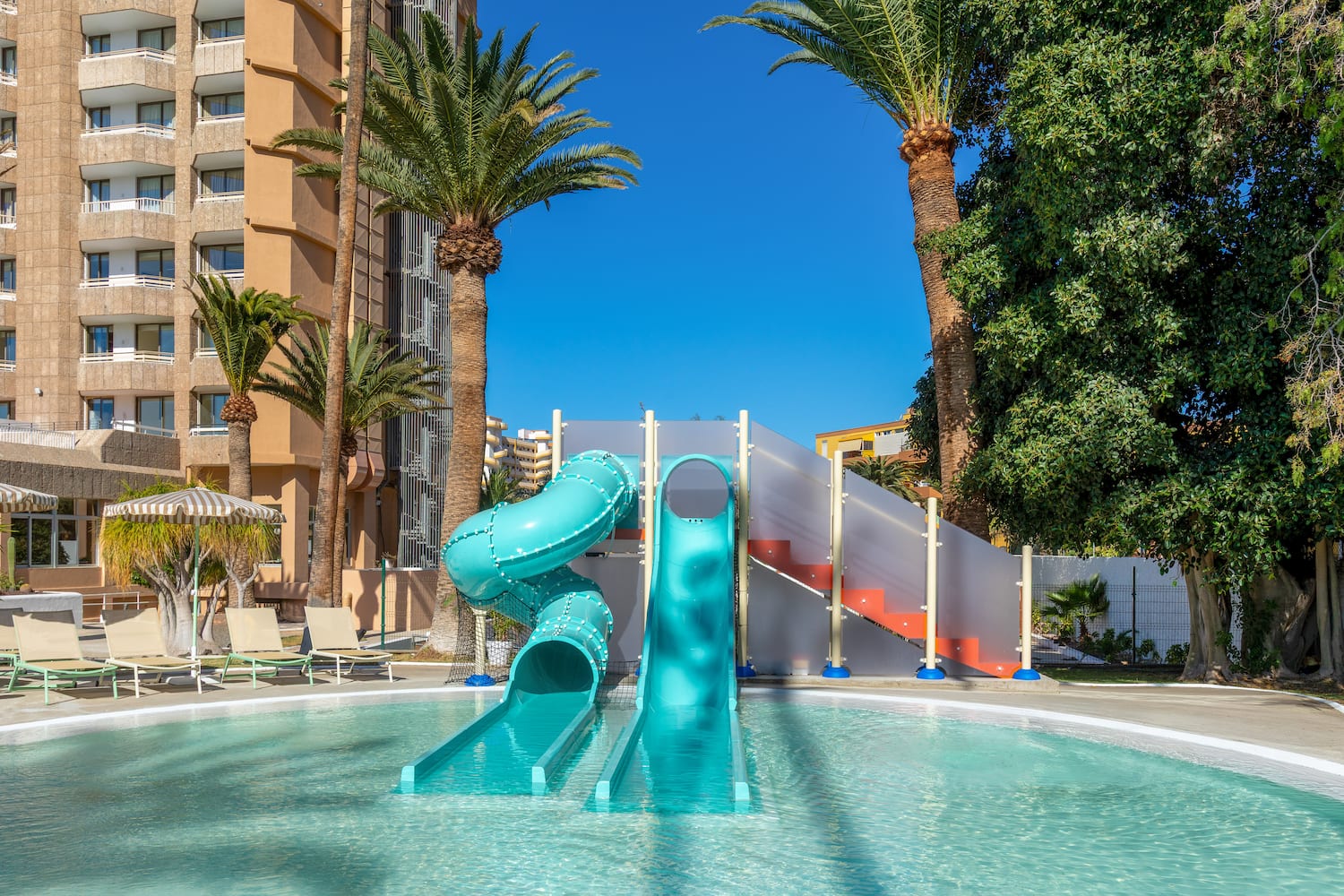 a water slide in a pool