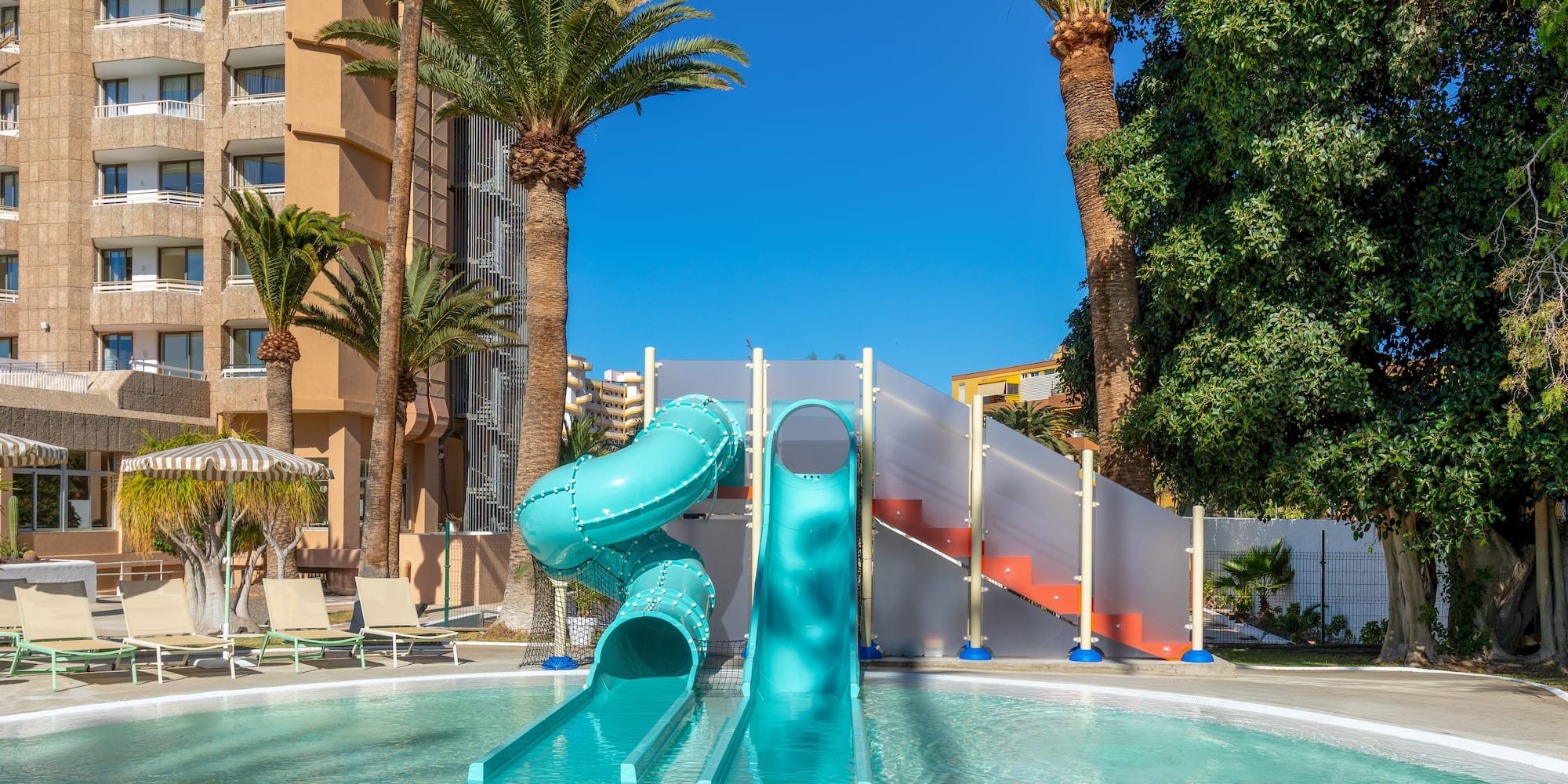 a water slide in a pool
