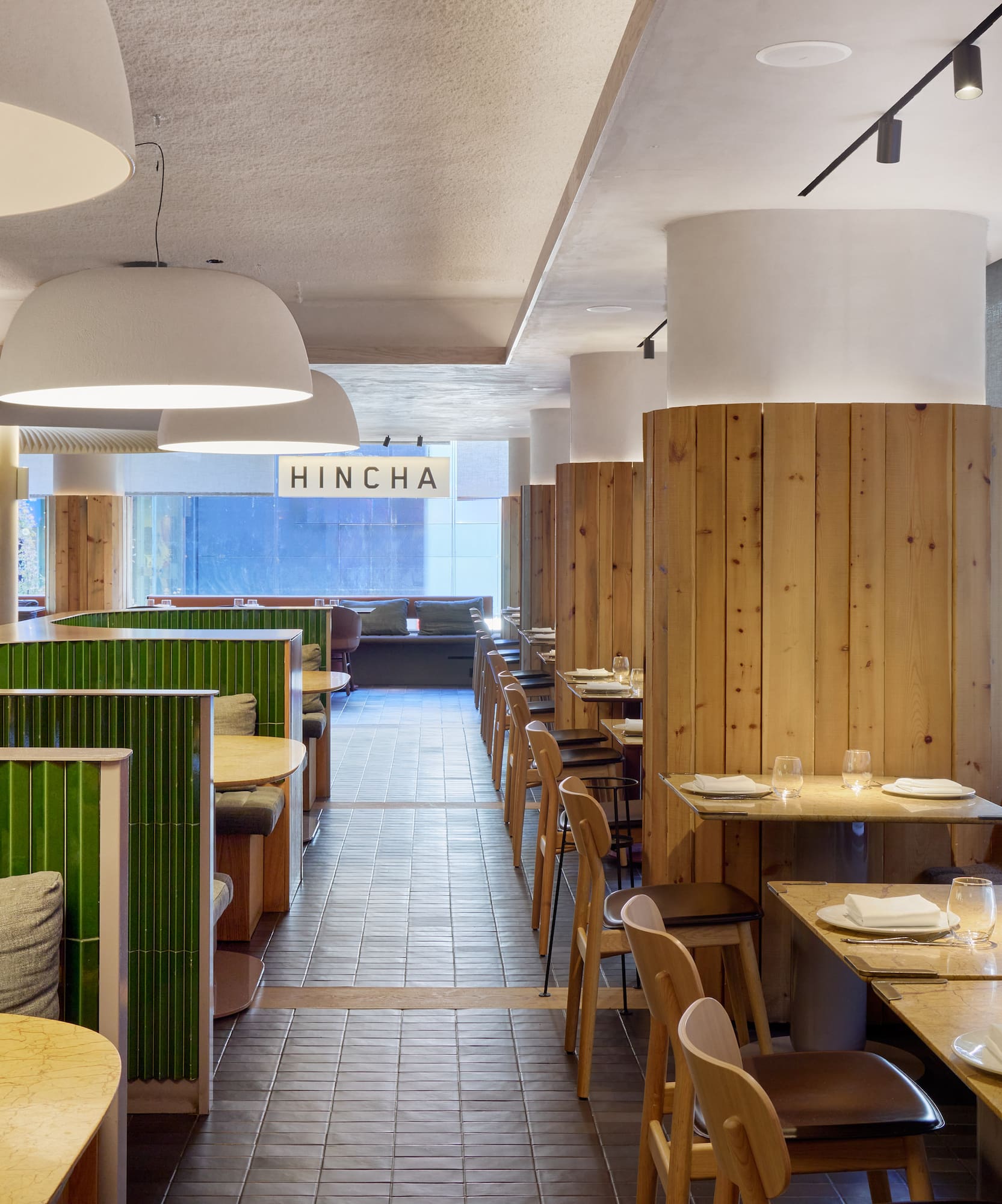 a restaurant with tables and chairs