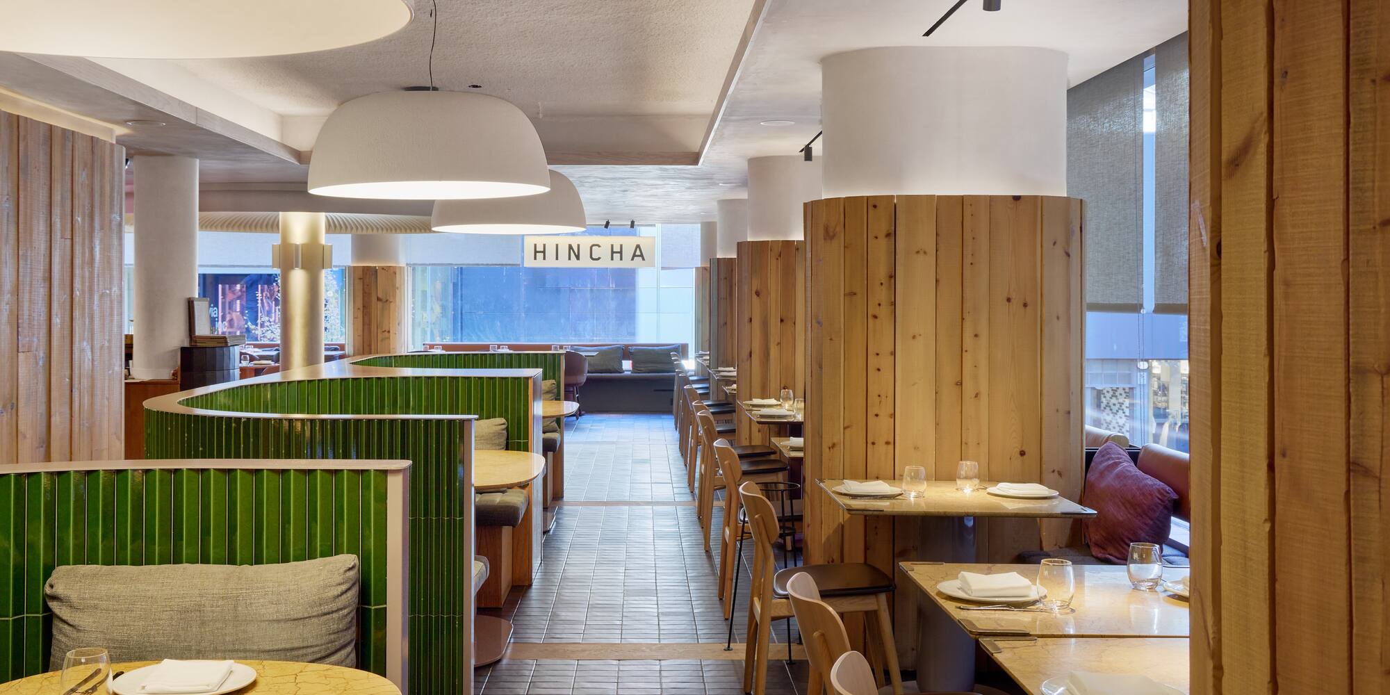 a restaurant with tables and chairs