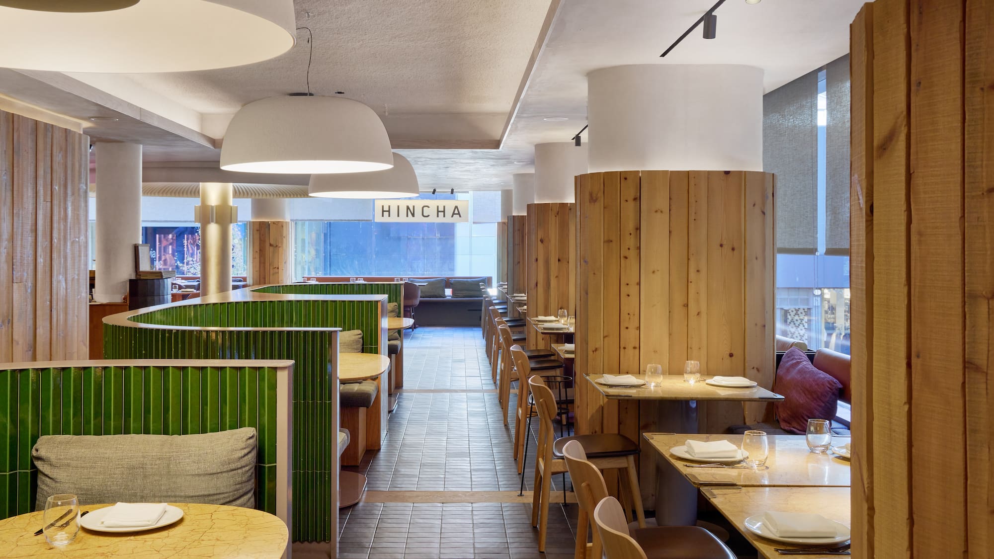 a restaurant with tables and chairs