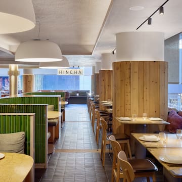 a restaurant with tables and chairs