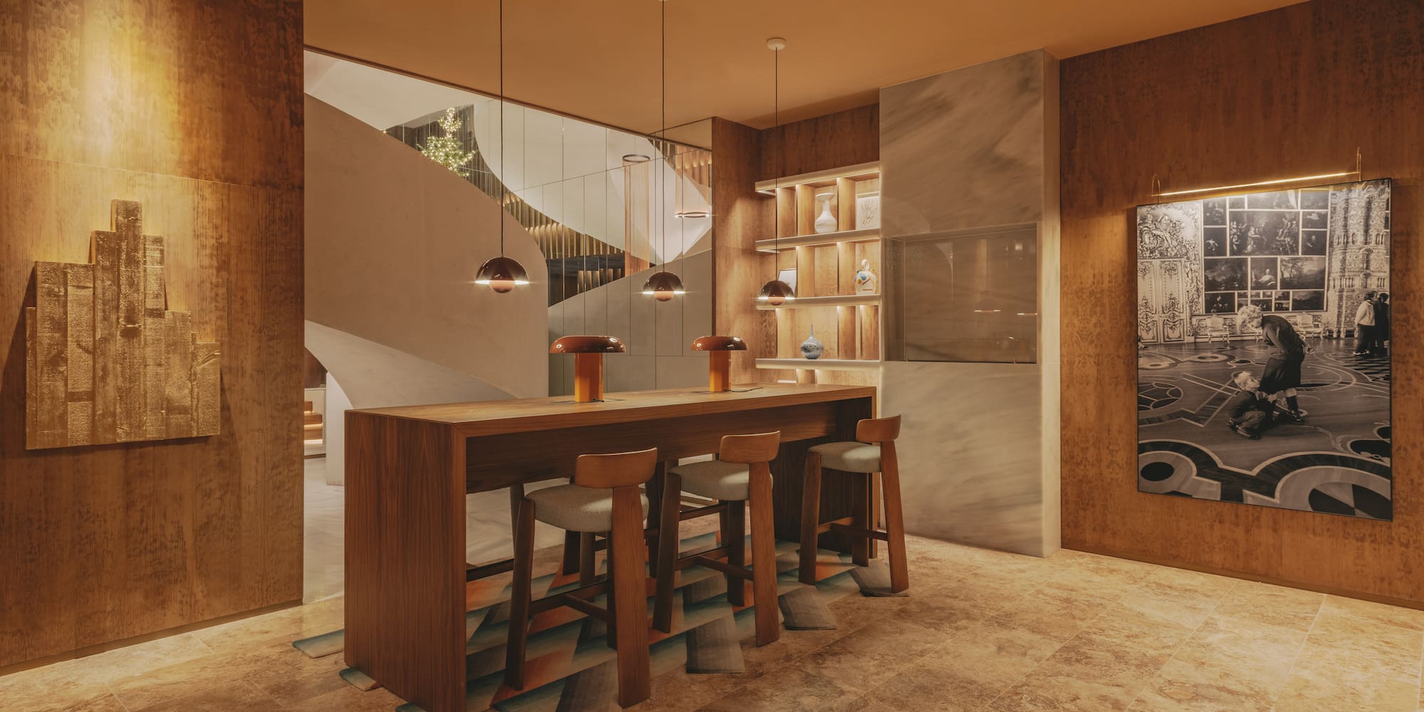 a room with a table and stools