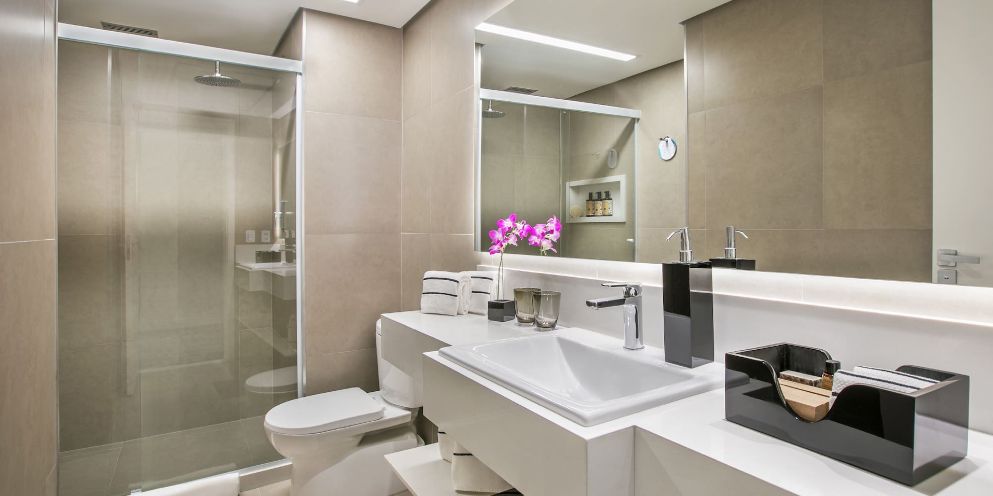 a bathroom with a shower and sink