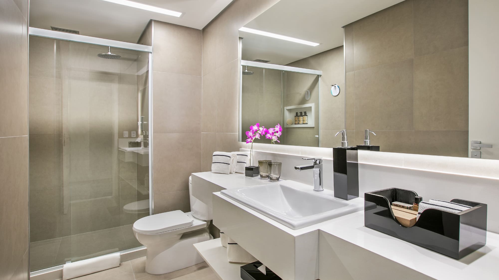 a bathroom with a shower and sink