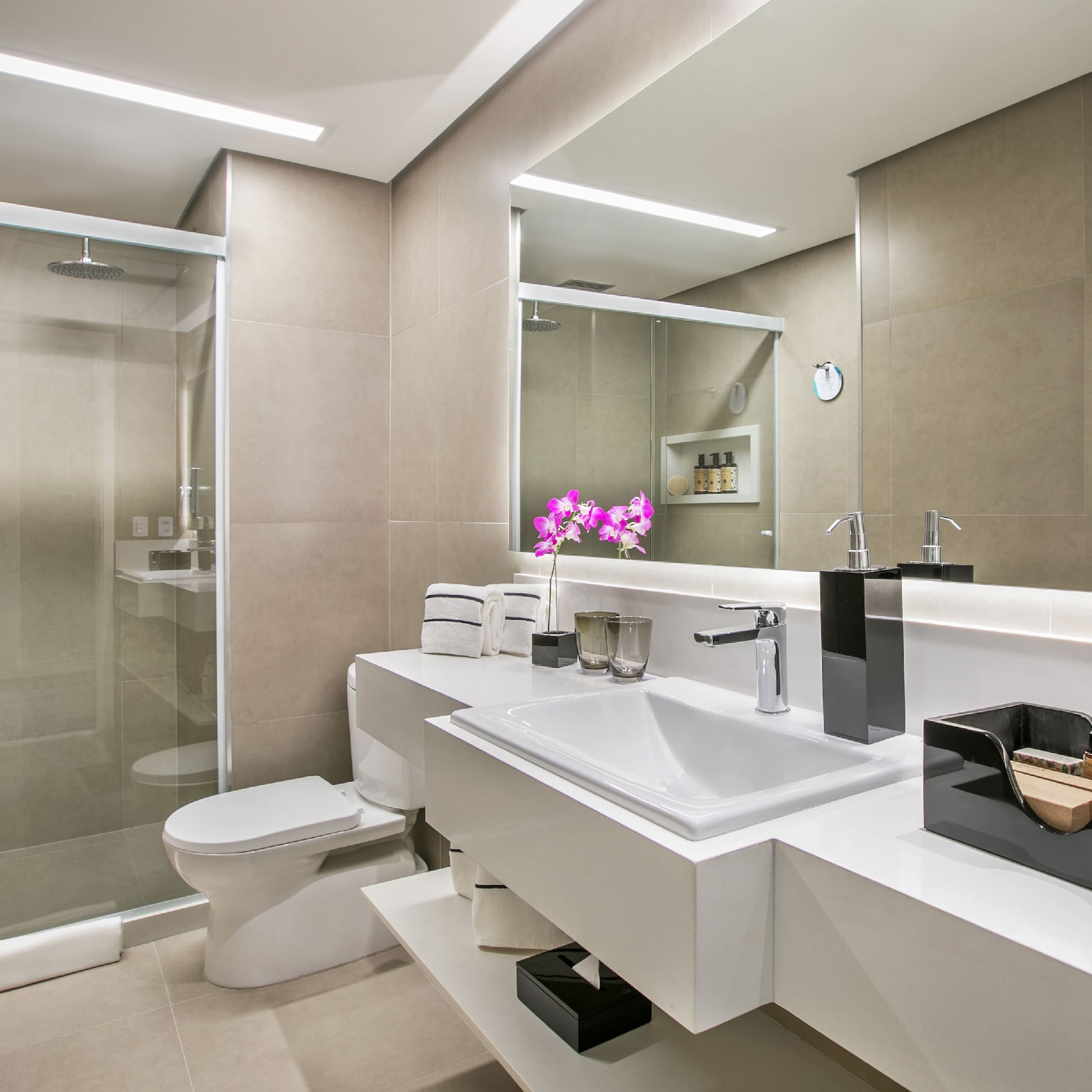 a bathroom with a shower and sink