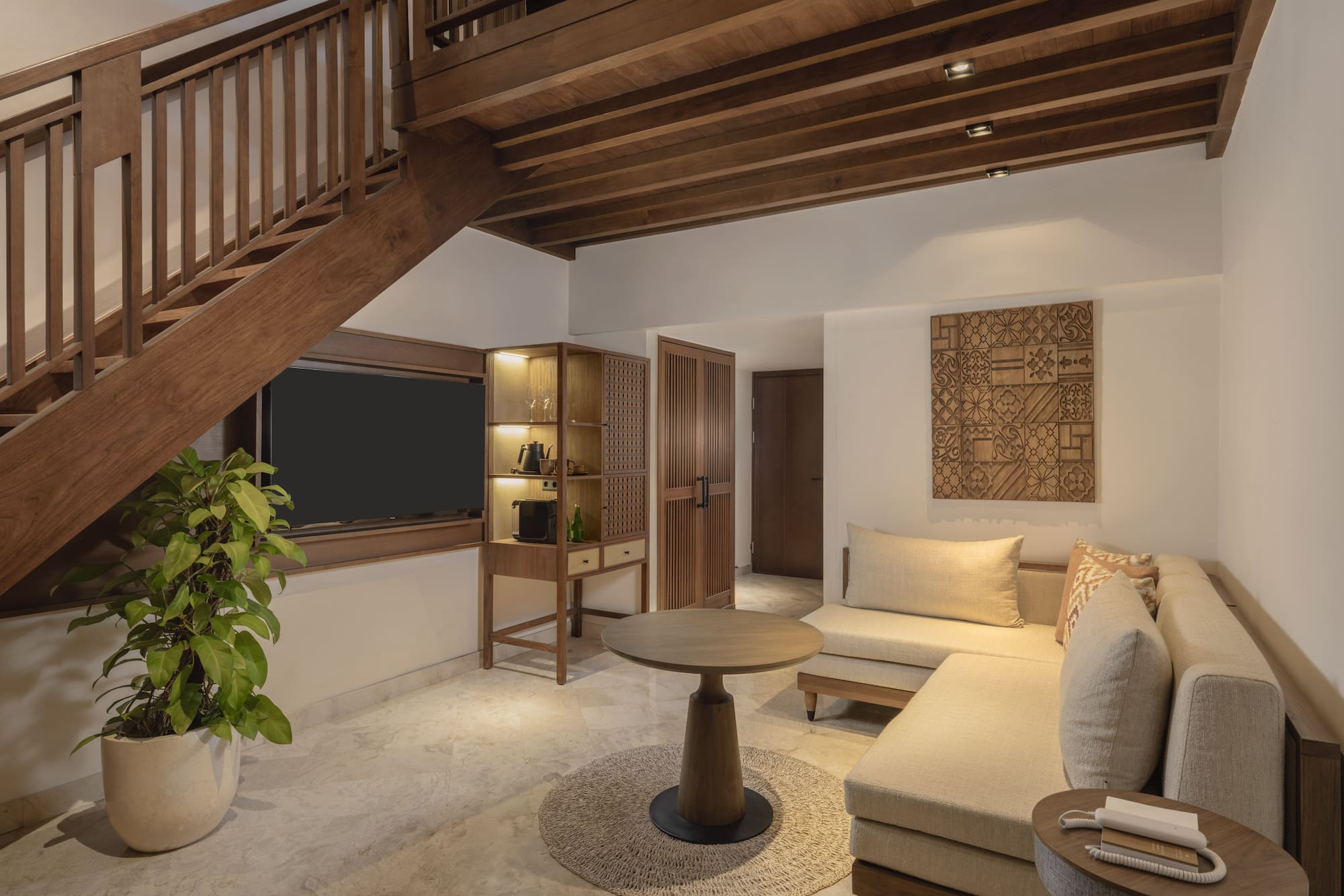 a living room with a couch and a table