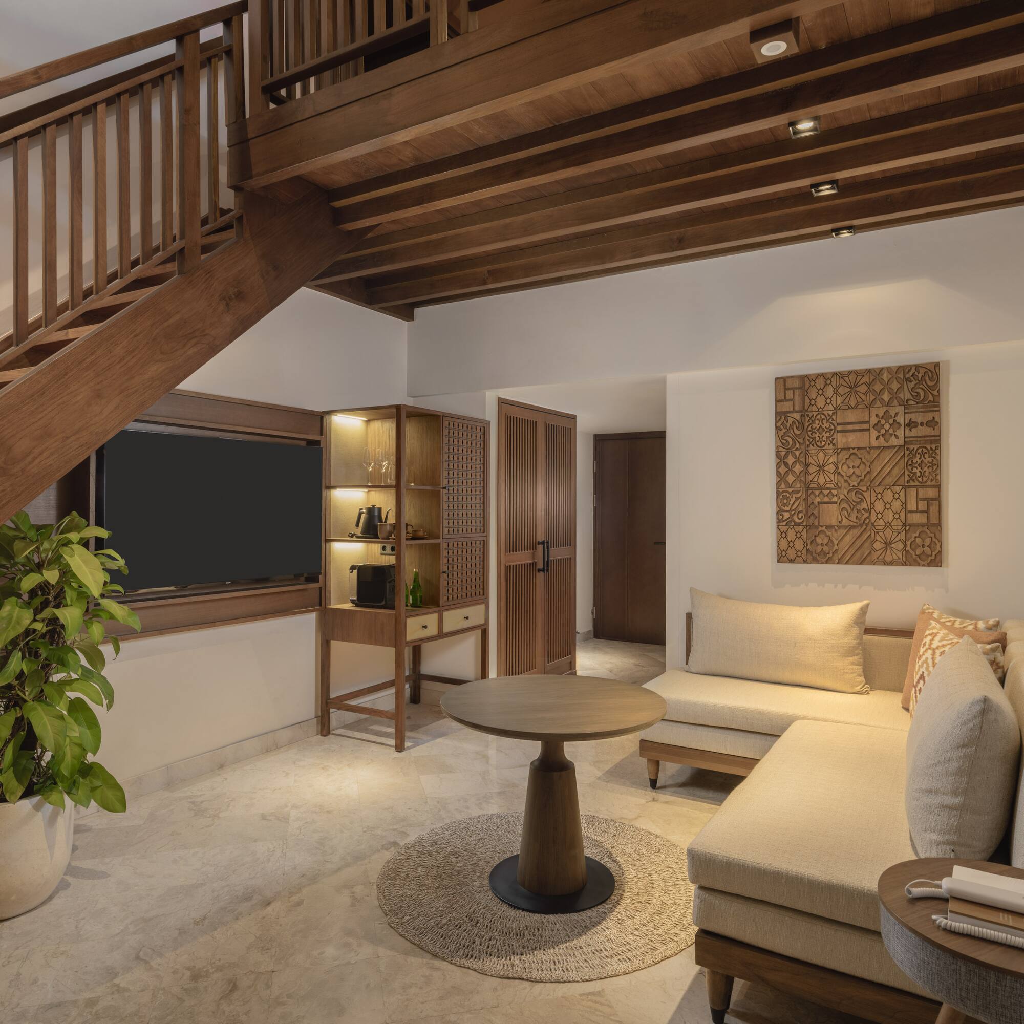 a living room with a couch and a table