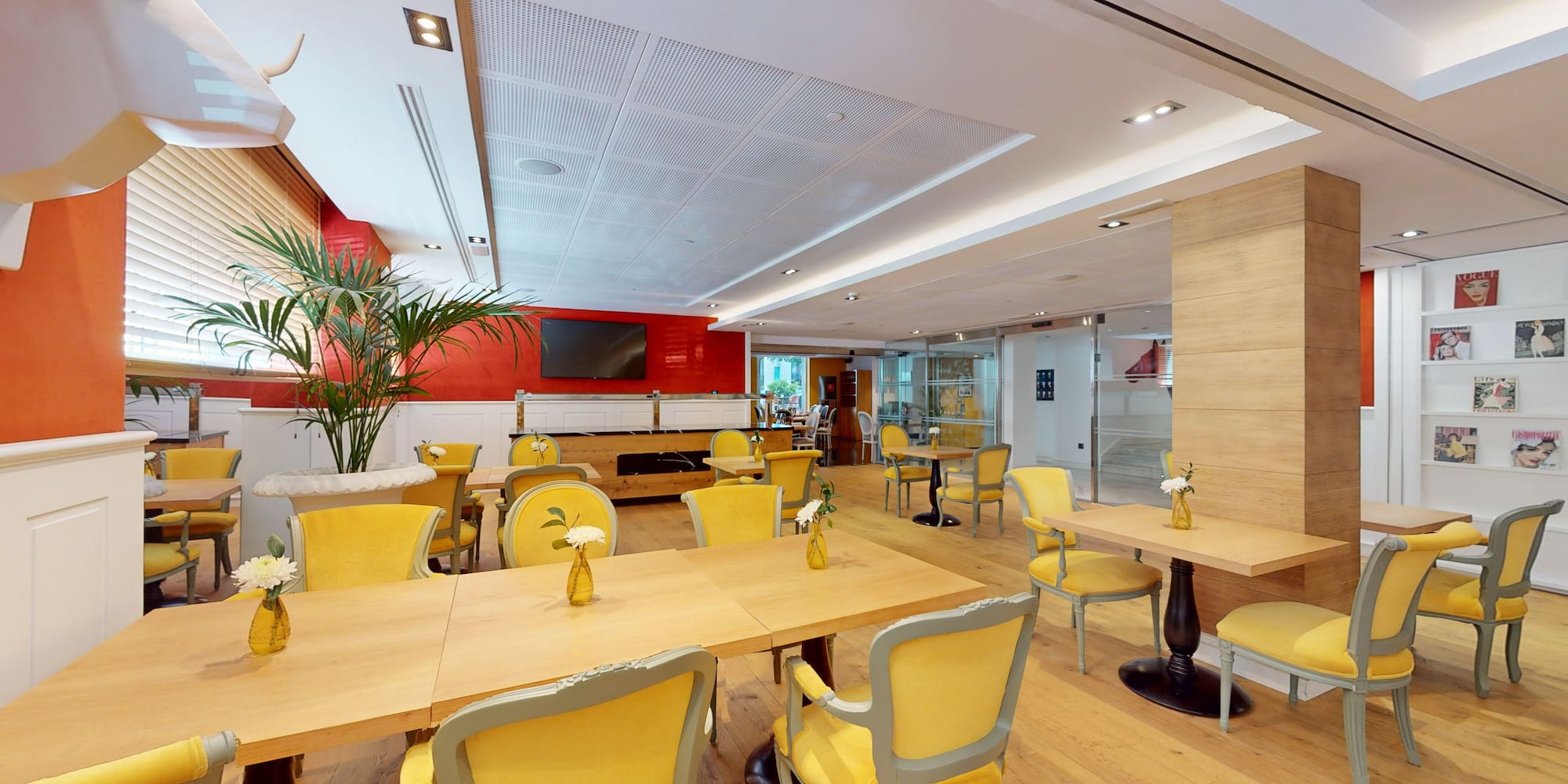 a room with tables and chairs