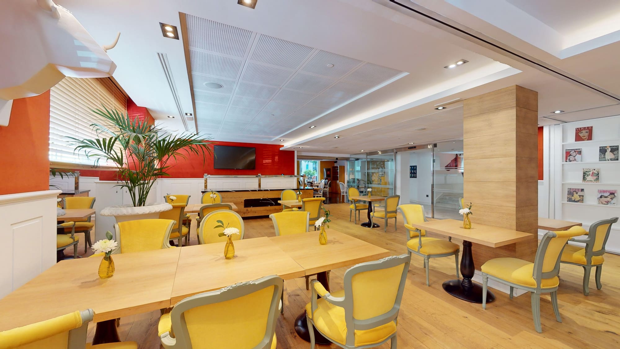 a room with tables and chairs