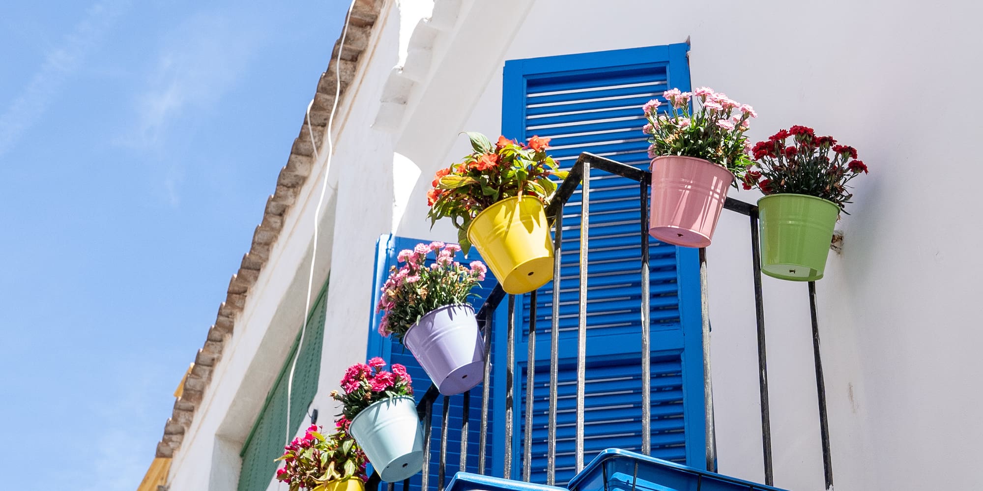 a balcony with flowers on it