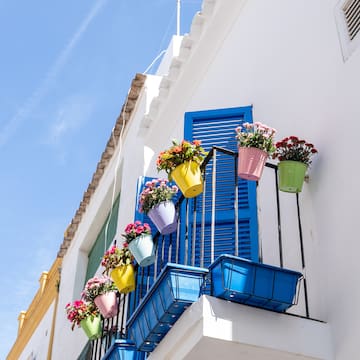 a balcony with flowers on it
