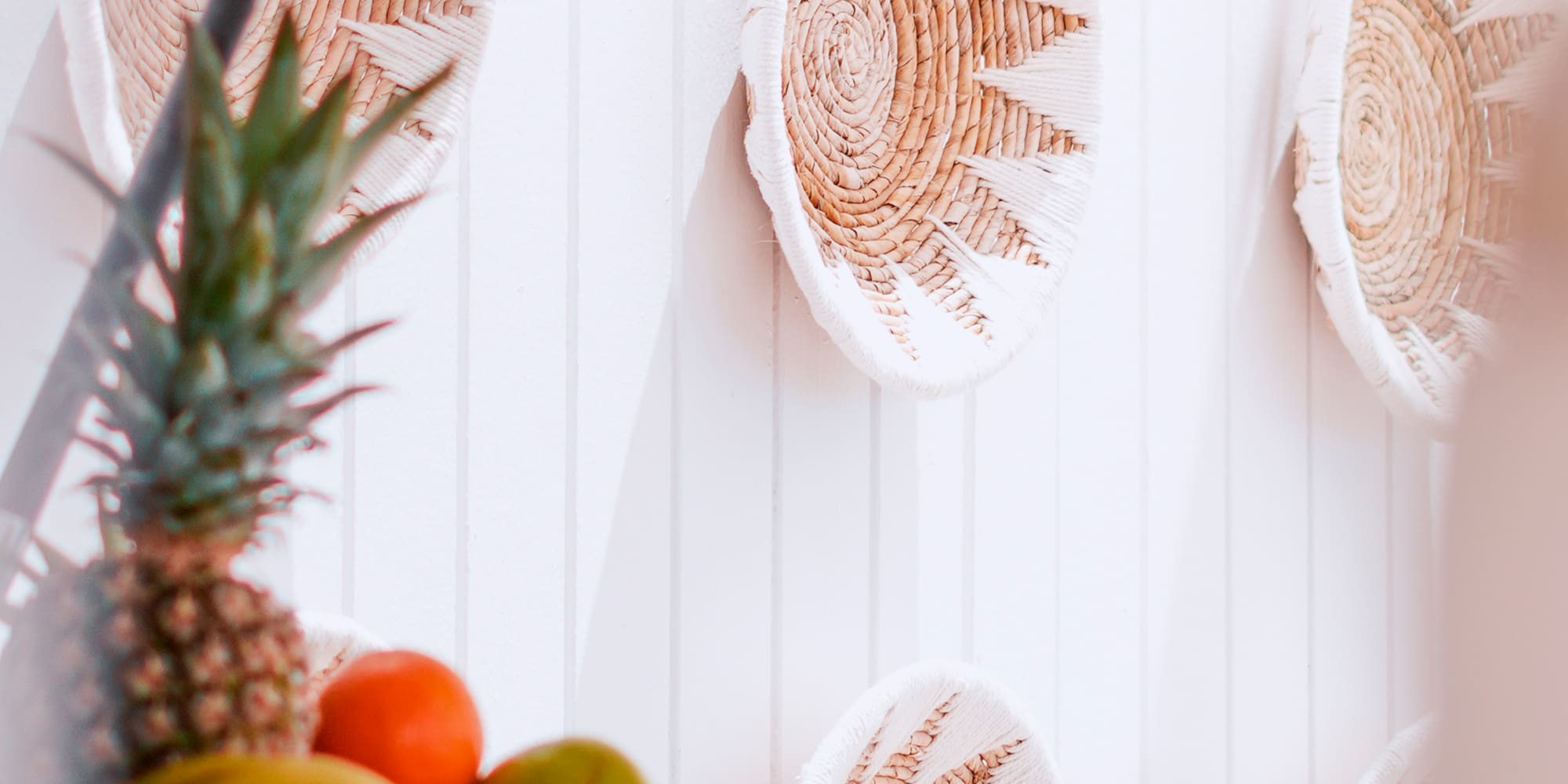a basket of fruit on a wall
