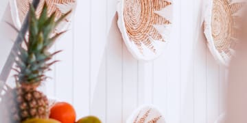 a basket of fruit on a wall