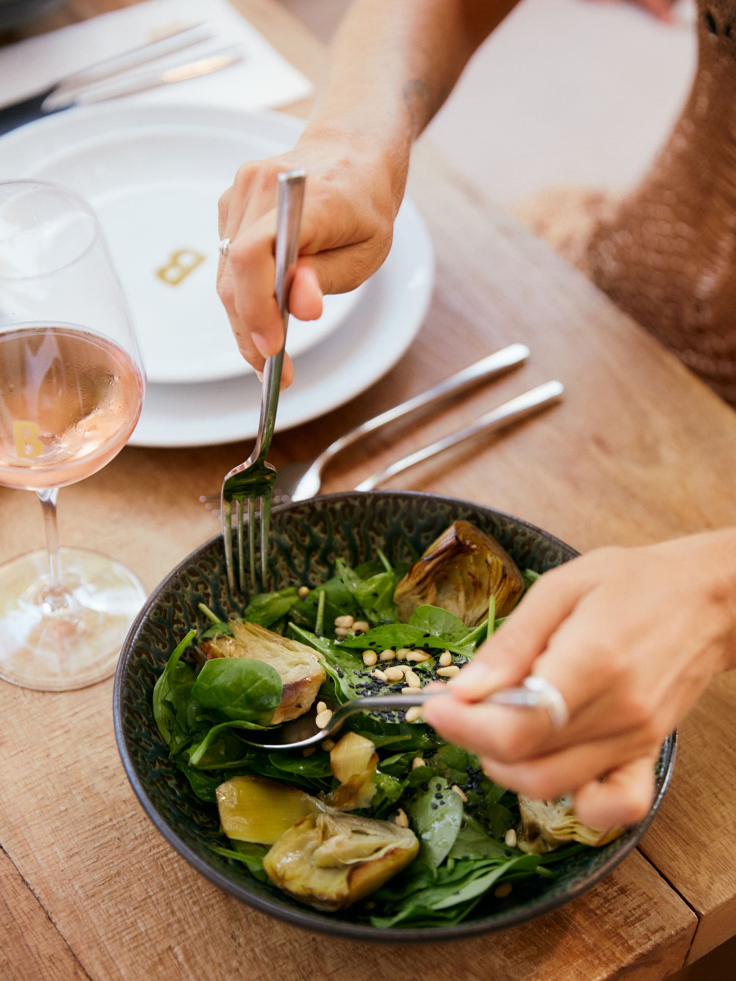 a person eating a salad