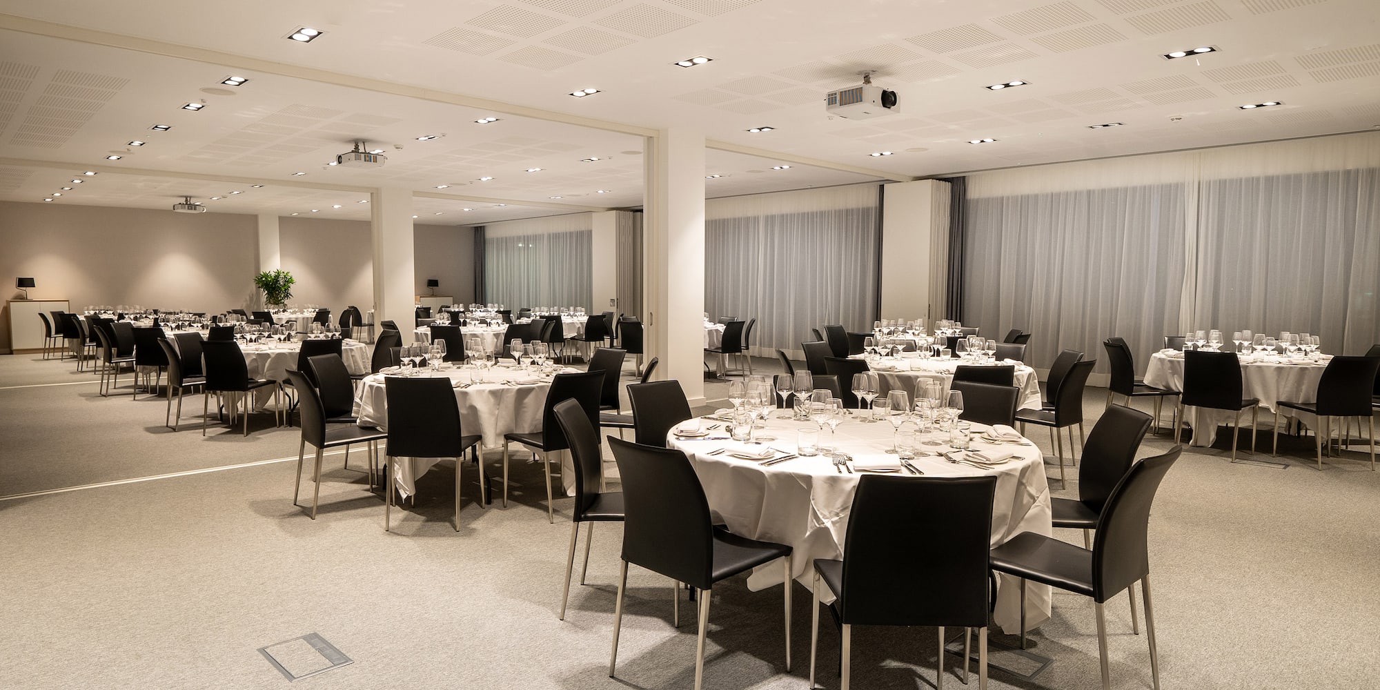 a room with tables and chairs