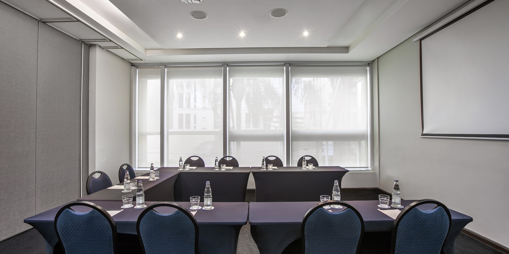 a room with tables and chairs