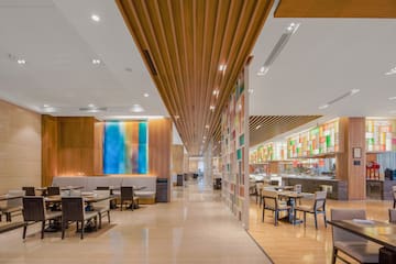 a restaurant with tables and chairs