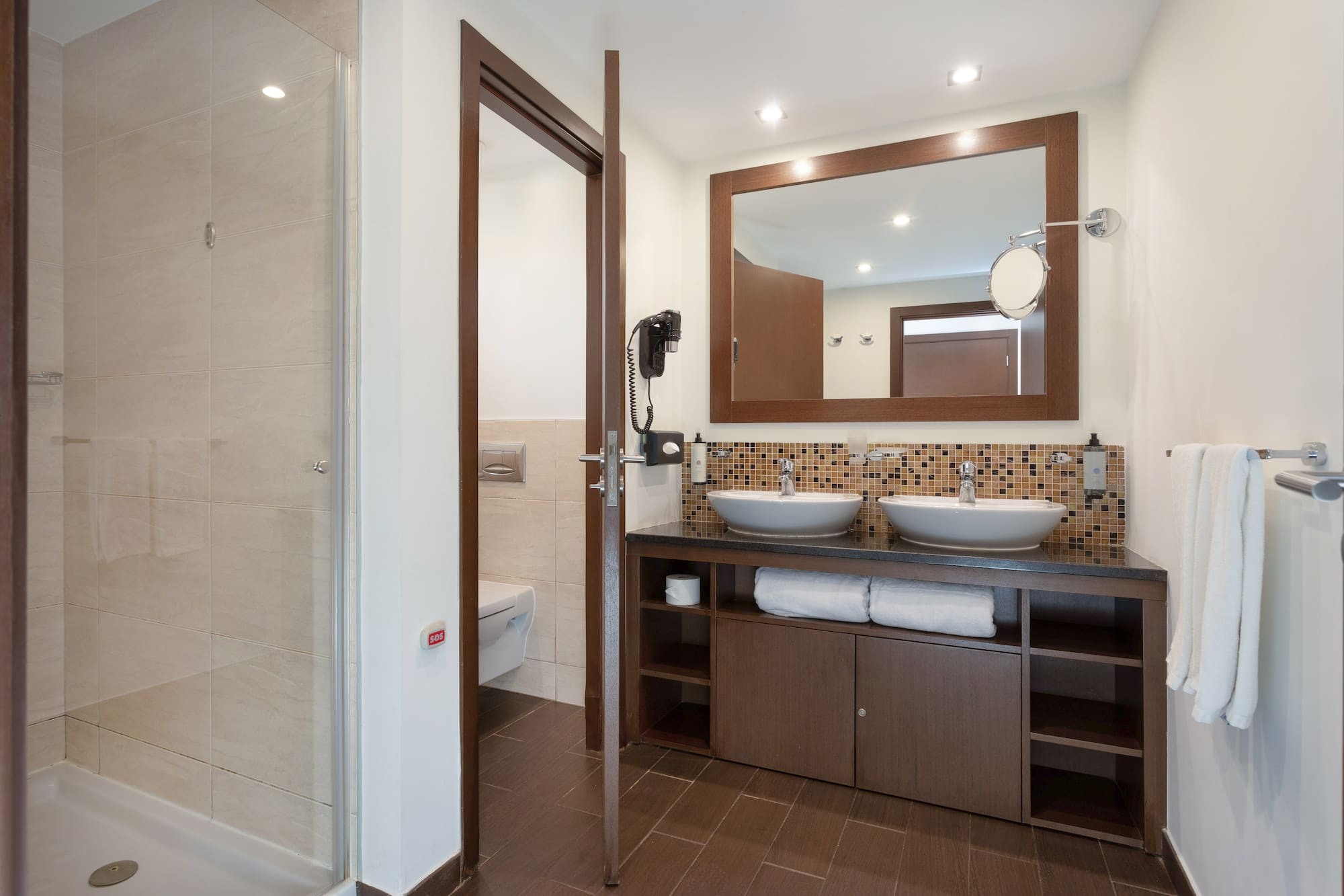 a bathroom with a mirror and sink