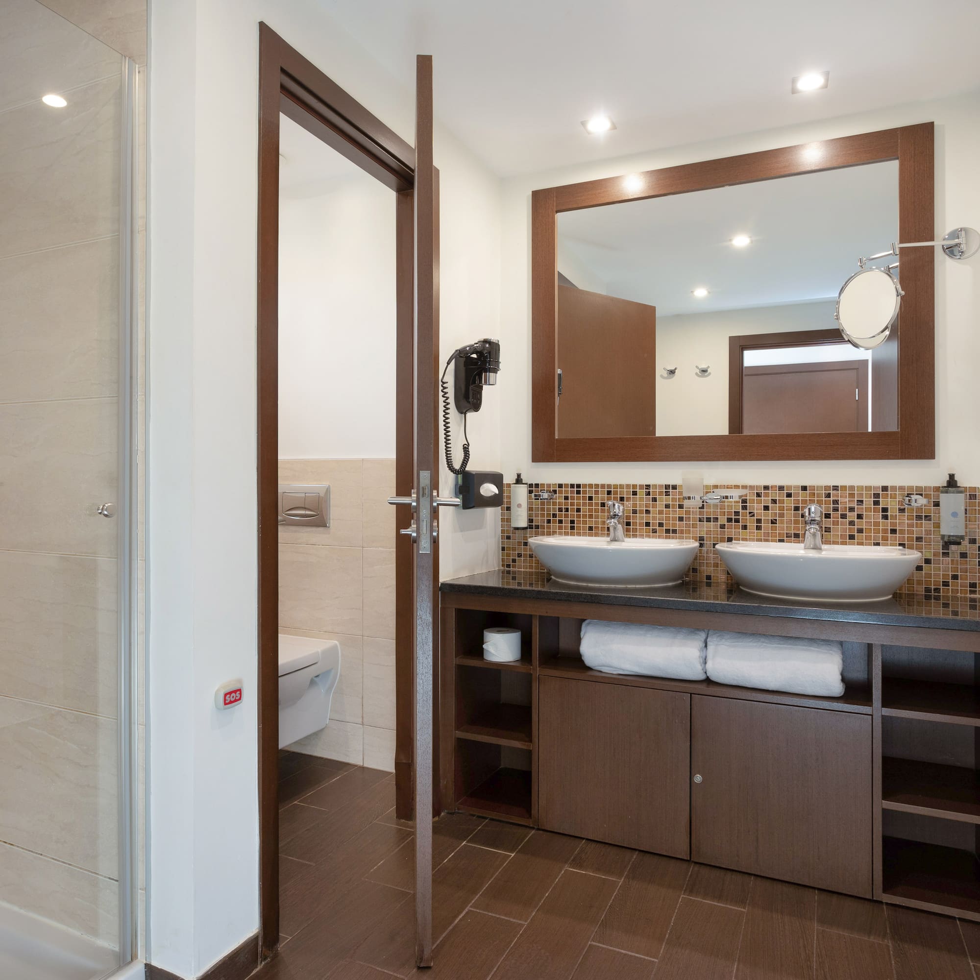 a bathroom with a mirror and sink