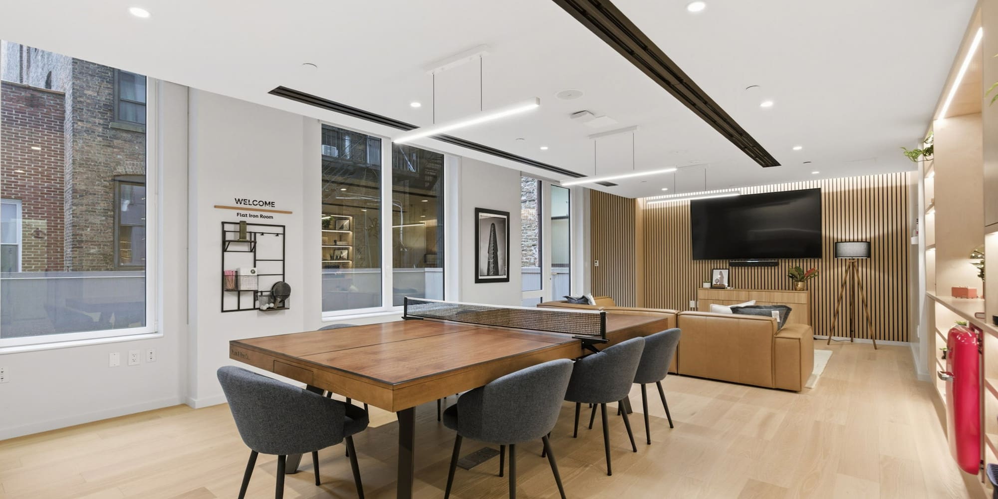 a room with a table and chairs