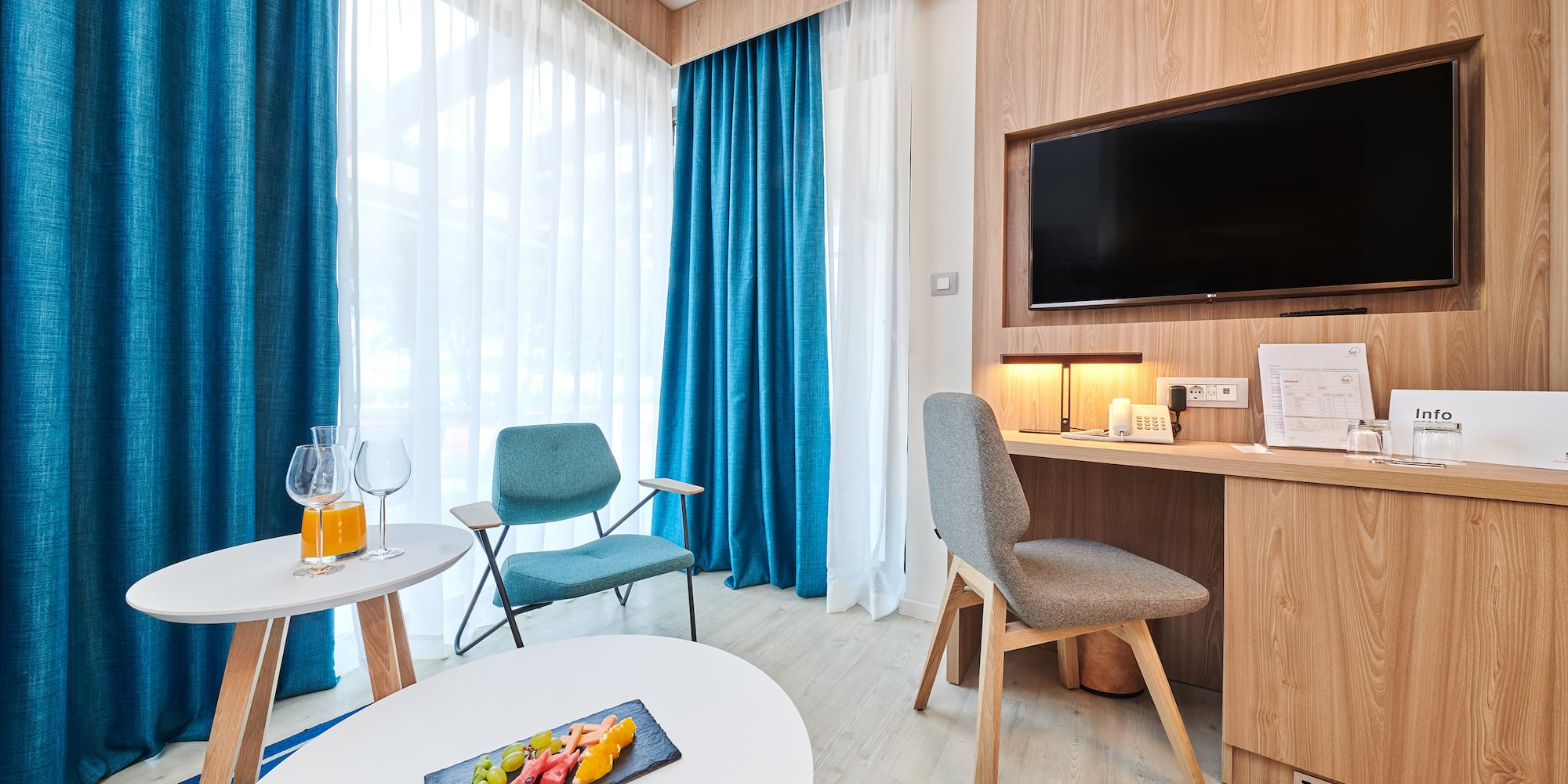 a room with a television and a table