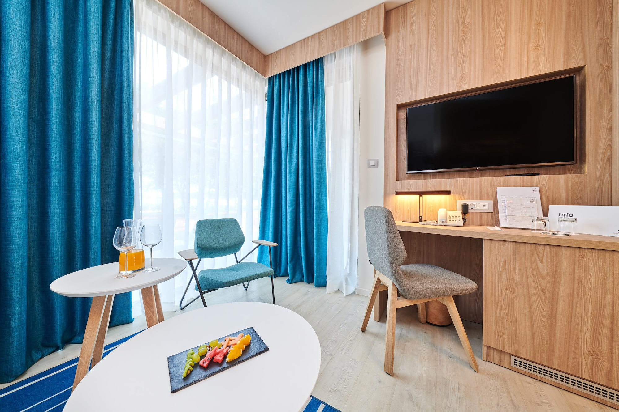 a room with a television and a table