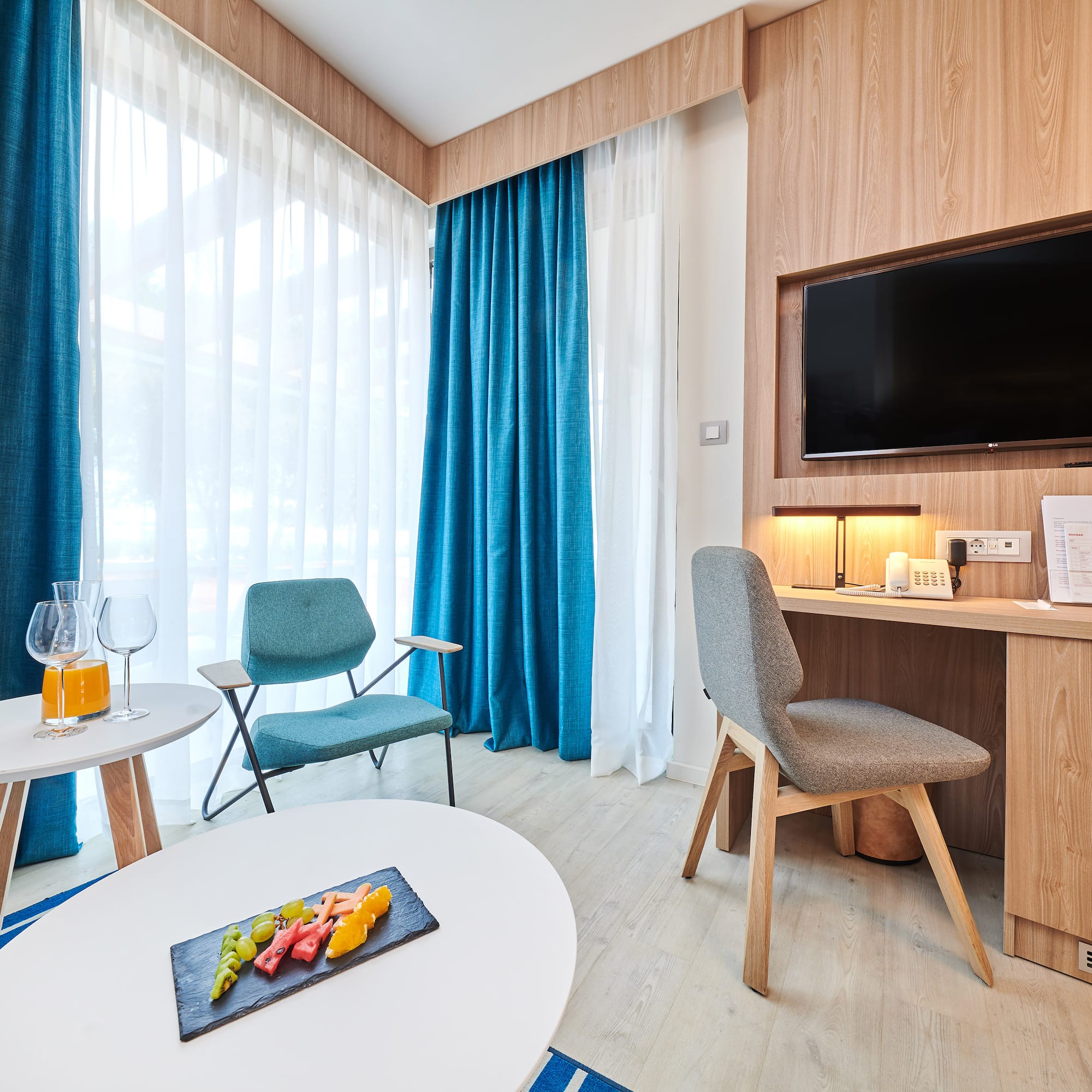 a room with a television and a table