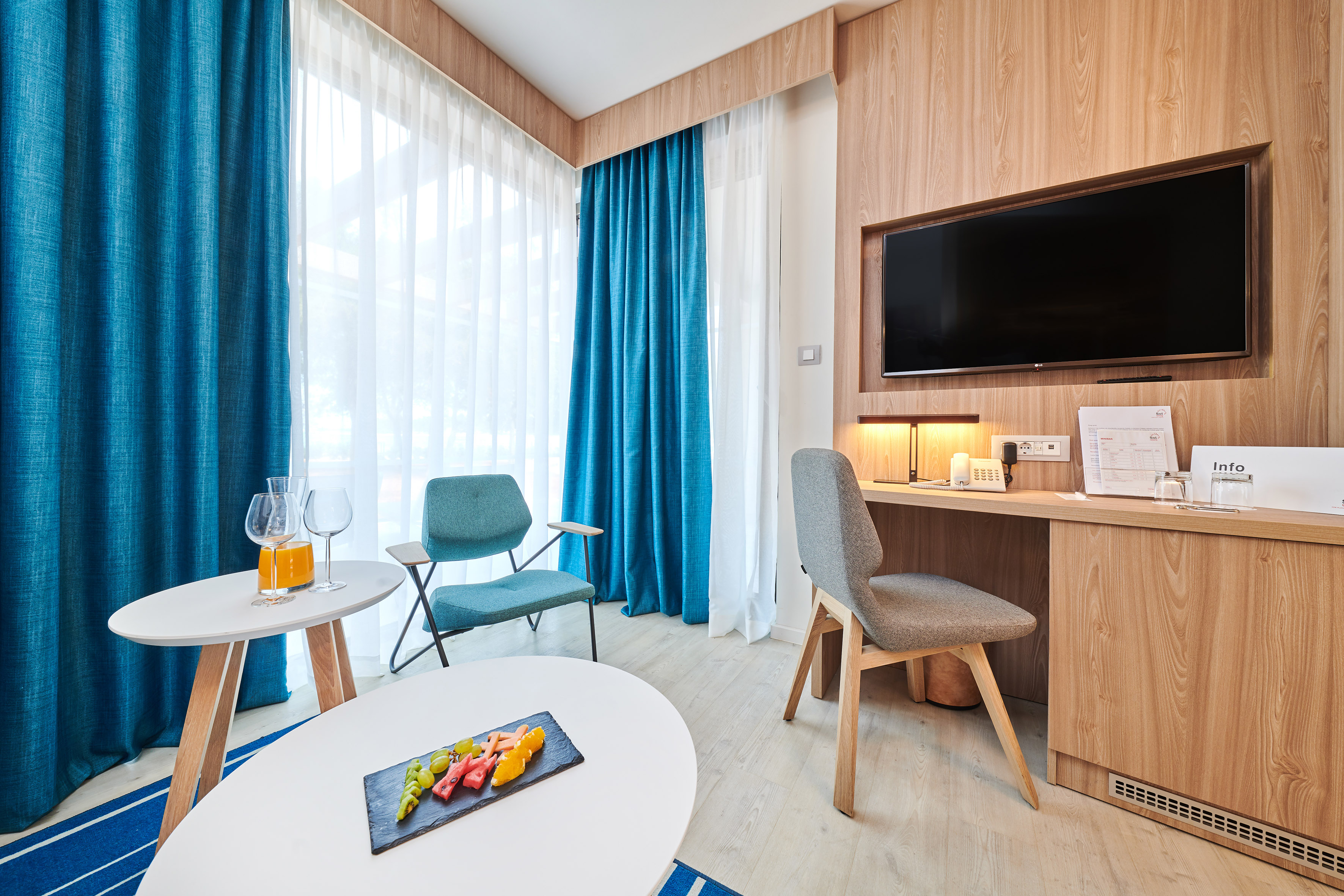 a room with a television and a table